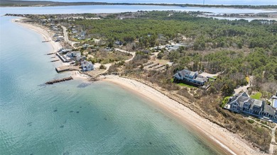 Set on an extraordinary 5.46 acres of direct bayfront in the - photo 1