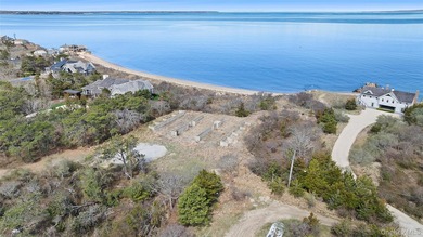 Set on an extraordinary 5.46 acres of direct bayfront in the - photo 4