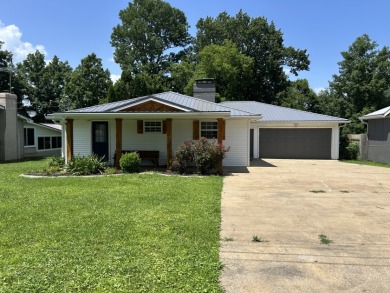 NEW PRICE!! Remodeled, waterfront, end dock & garage - photo 1