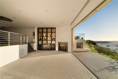 Perched on the coveted Corona del Mar bluff, this exceptional - photo 4