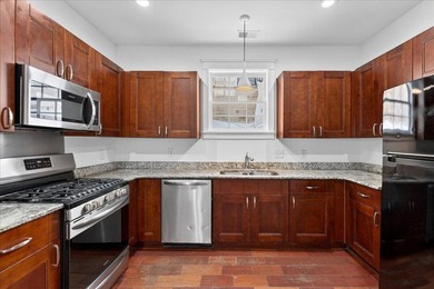 This beautifully renovated historic duplex features two units - photo 32
