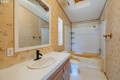 BRAND NEW ROOF, HEAT PUMP & CARPET! This 3-bed, 2-bath MFH on a - photo 23