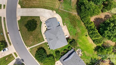 Drive into this sidewalk lined, tree surrounded community, to - photo 25