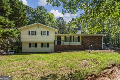 Fully remodeled and move-in ready, this updated 1980s - photo 1
