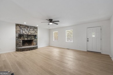 Fully remodeled and move-in ready, this updated 1980s - photo 4