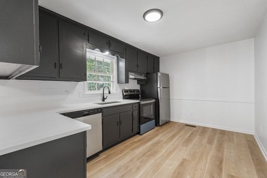 Fully remodeled and move-in ready, this updated 1980s - photo 8