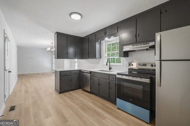 Fully remodeled and move-in ready, this updated 1980s - photo 9