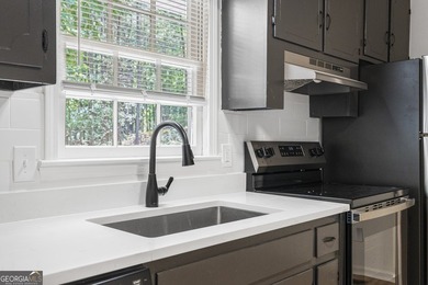 Fully remodeled and move-in ready, this updated 1980s - photo 10
