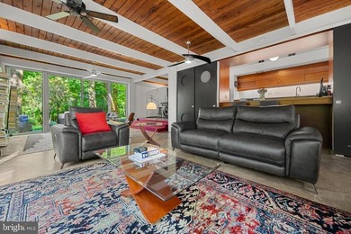 Some homes are built. This one was conceived.Designed in 1961 by - photo 12