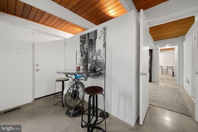 Some homes are built. This one was conceived.Designed in 1961 by - photo 30