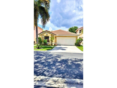Lake Home For Sale in Coral Springs, Florida