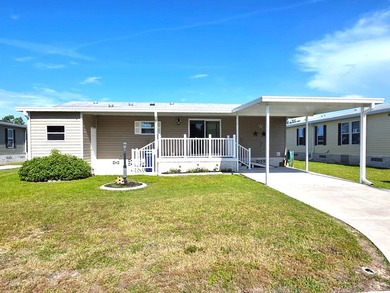 THIS HOME IS ON LEASED LAND WITH A MONTHLY LOT RENT THAT HAS - photo 3