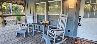 Discover this charming cabin, perfect for year-round living or a - photo 9