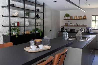 Featured on Netflix's Designing Miami, this fully renovated - photo 16