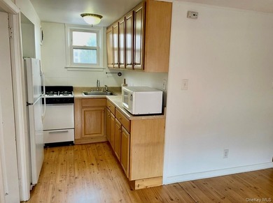 Woodlawn legal brick Triplex! Well maintained home with 3 bright - photo 25