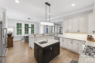 Located in the highly sought-after gated community of Cramer - photo 13