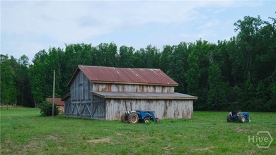 Tucked away on over 15 private acres in highly sought after - photo 5