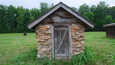 Tucked away on over 15 private acres in highly sought after - photo 10