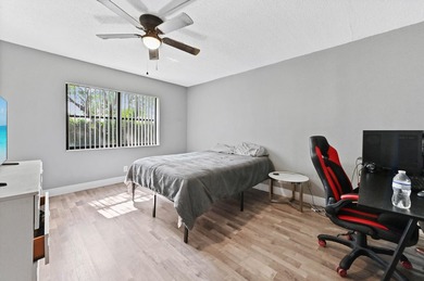 Discover this charming 2-bedroom, 2-bathroom ground floor - photo 12