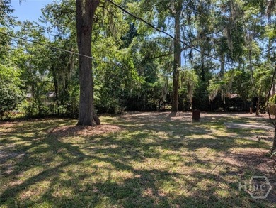 Welcome home to this charming all-brick ranch nestled on a huge - photo 3