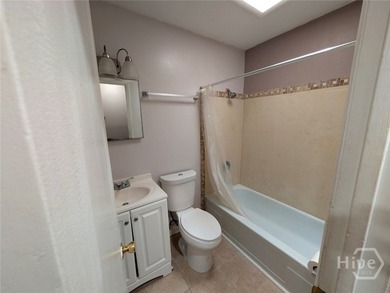 Welcome home to this charming all-brick ranch nestled on a huge - photo 6