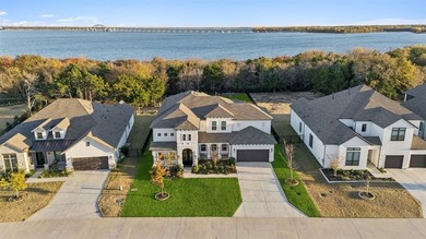 Backing to the shimmering shores of Lake Lewisville, this - photo 1