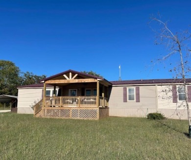 Lake Home For Sale in Sadler, Texas