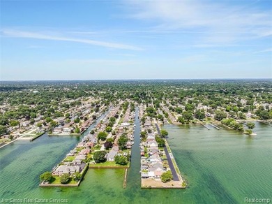 Welcome home to this updated, canal-front, brick ranch, with - photo 3