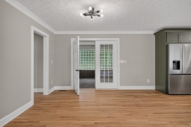 Completely remodeled and move-in ready! This beautiful brick - photo 11