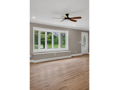 Completely remodeled and move-in ready! This beautiful brick - photo 13