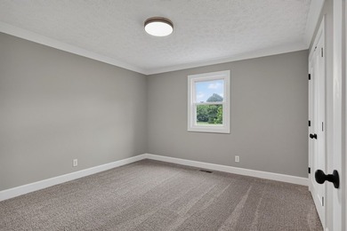 Completely remodeled and move-in ready! This beautiful brick - photo 20
