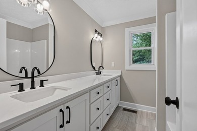 Completely remodeled and move-in ready! This beautiful brick - photo 23