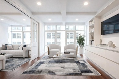 Residence 6/7A is a rare triplex loft-style home occupying the - photo 2
