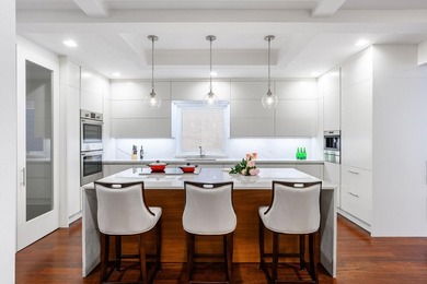 Residence 6/7A is a rare triplex loft-style home occupying the - photo 3