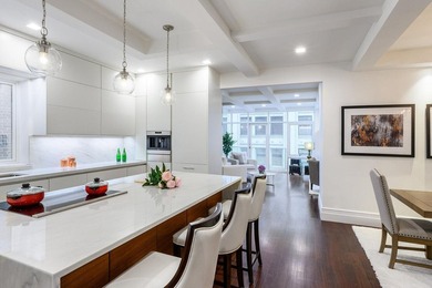 Residence 6/7A is a rare triplex loft-style home occupying the - photo 4