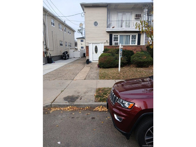 This is a charming two-family home that offers great potential - photo 1