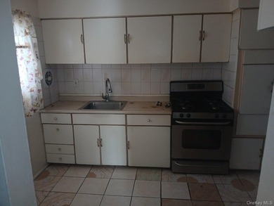 This is a charming two-family home that offers great potential - photo 5