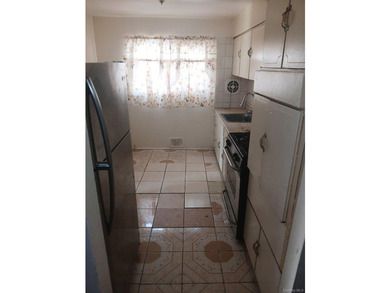 This is a charming two-family home that offers great potential - photo 6