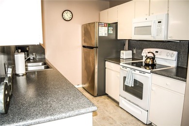 Escape to the beach with this charming, fully furnished condo - photo 12