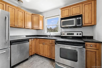 Welcome to 56 Inlet Rd W, a charming two-story cape home nestled - photo 12