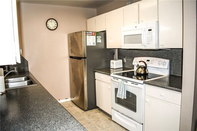 Escape to the beach with this charming, fully furnished condo - photo 13