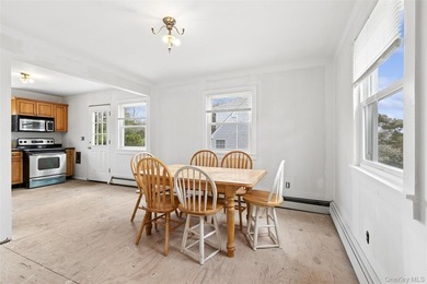 Welcome to 56 Inlet Rd W, a charming two-story cape home nestled - photo 14