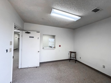 Prime location on Holland Avenue! This spacious commercial