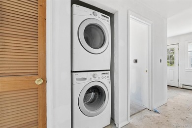 Welcome to 56 Inlet Rd W, a charming two-story cape home nestled - photo 15