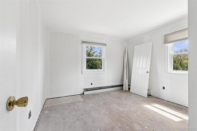 Welcome to 56 Inlet Rd W, a charming two-story cape home nestled - photo 16