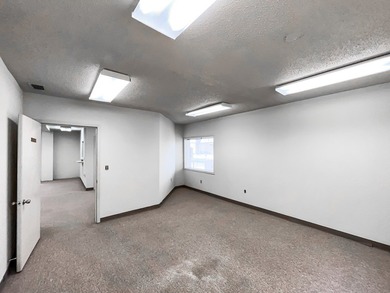Prime location on Holland Avenue! This spacious commercial