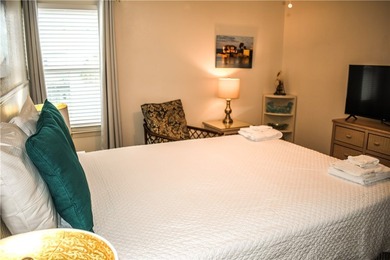 Escape to the beach with this charming, fully furnished condo - photo 18