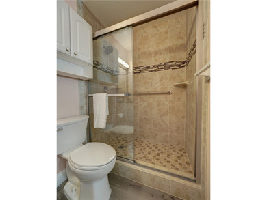 Escape to the beach with this charming, fully furnished condo - photo 20