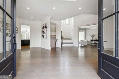 Stunning 9,900 sq ft custom estate located in a prestigious - photo 3