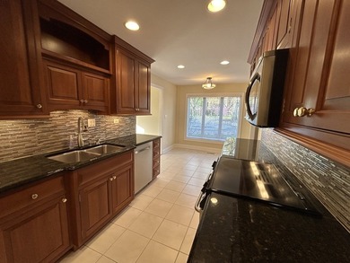 Welcome to this beautiful 1st floor, end unit. This coveted - photo 13